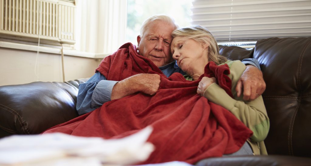 elderly senior couple cold in winter